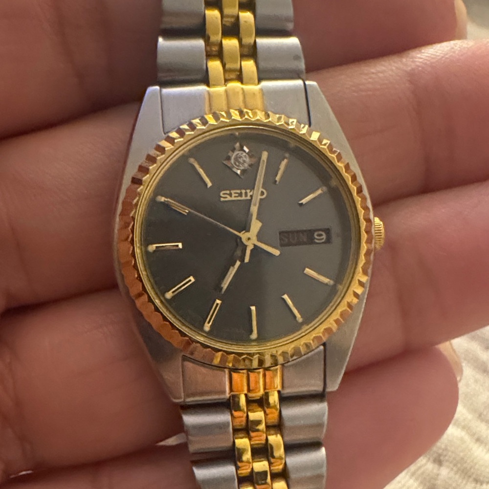 Seiko Gold and Silver Watch with Dark Dial
